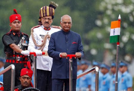 India's new President Ram Nath Kovind inspects an honour guard after being sworn in at the Rashtrapati Bhavan presidential palace in New Delhi, India July 25, 2017. REUTERS/Cathal McNaughton