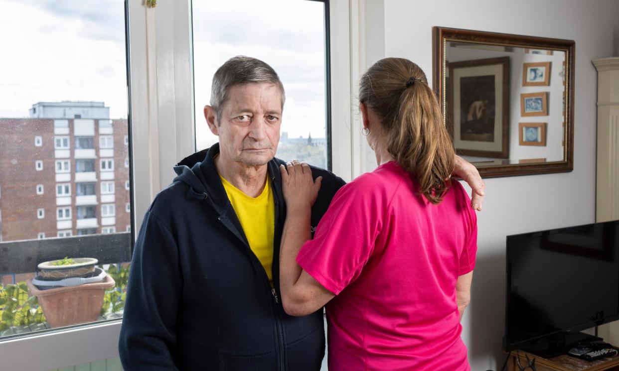 <span>Helen Grater, pictured with her partner, Mark Young, says of the Department for Work and Pensions: ‘They just want the money. They fob you off and fob you off and then you give up. It’s absolutely disgraceful.’</span><span>Photograph: Graeme Robertson/The Guardian</span>
