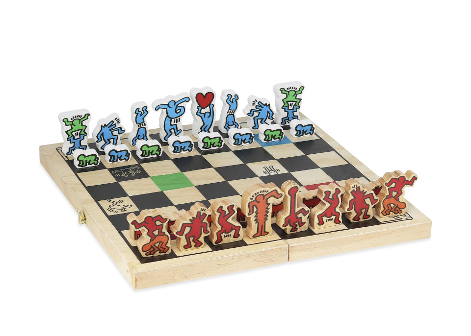 This image provided by Museum of Modern Art shows a chess set with colourful pieces. The Museum of Modern Art's exclusive Keith Haring chess set has been popular for years. "It features Keith's beloved motifs like dancing figures, babies and dogs, all in colorful lacquered wood,". (Museum of Modern Art via AP)