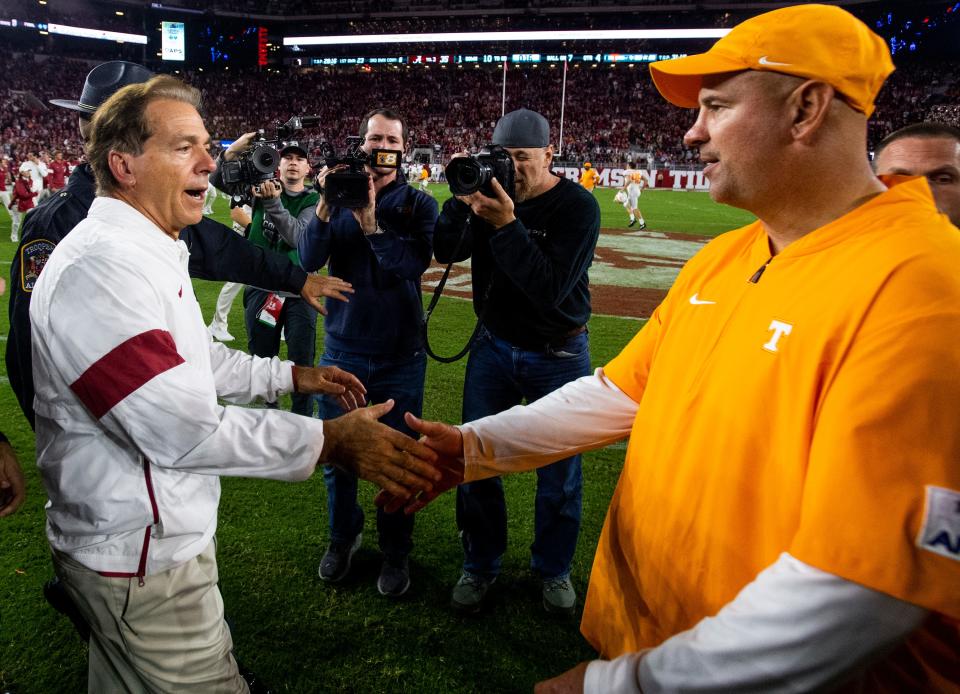 Alabama head coach Nick Saban and Tennessee head coach Jeremy Pruitt meet at midfield after their game at Bryant-Denny Stadium in Tuscaloosa, Ala., on Saturday October 19, 2019.