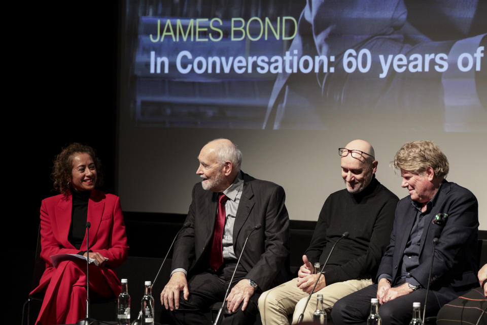 Samira Ahmed, from left, is seen interviewing Michael G.Wilson, Neal Purvis, and Rob Wade on stage at the ÔIn Conversation: 60 Years of James BondÕ event at the BFI Southbank, London, Friday 30th Sept. 2022. (Photo credit Millie Turner/BFI)
