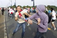 Despite a heavy police presence, skirmishes between Russian and Polish football fans broke out in the city centre.