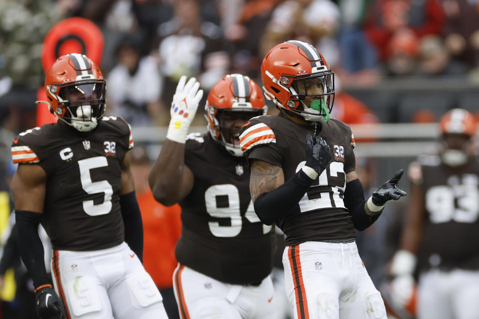 Cleveland Browns safety Grant Delpit (22) reacts after sacking Jacksonville Jaguars quarterback Trevor Lawrence during the first half of an NFL football game, Sunday, Dec. 10, 2023, in Cleveland. (AP Photo/Ron Schwane)