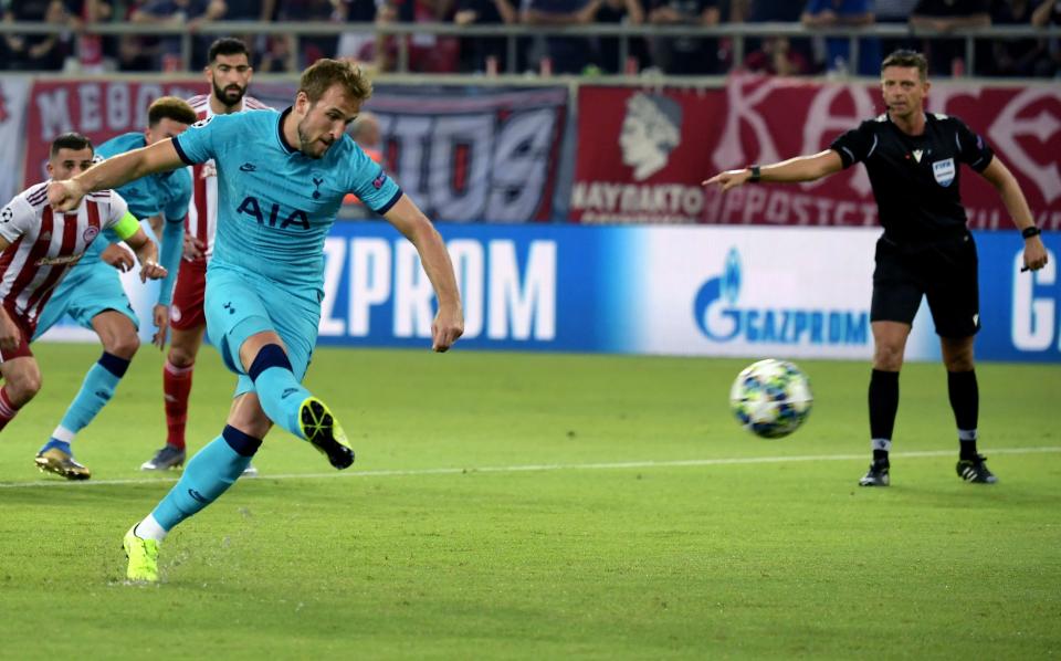 Harry Kane gives Spurs the lead. (Photo credit should read ARIS MESSINIS/AFP/Getty Images)