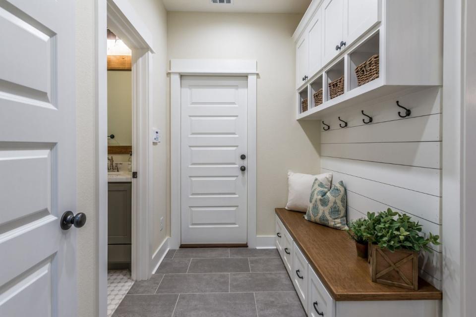 An example of shiplap installed in a mudroom.