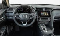 <p>At first glance, the Honda Insight looks like your average <a href="https://www.caranddriver.com/honda/civic" rel="nofollow noopener" target="_blank" data-ylk="slk:Civic sedan;elm:context_link;itc:0;sec:content-canvas" class="link ">Civic sedan</a>, but get inside and you’re greeted with an interior that borrows elements and an upscale vibe from <a href="https://www.caranddriver.com/honda/accord" rel="nofollow noopener" target="_blank" data-ylk="slk:the bigger Accord;elm:context_link;itc:0;sec:content-canvas" class="link ">the bigger Accord</a>. There’s ample passenger and cargo room along with a touch screen infotainment system and high-quality materials. This is an affordable hybrid that doesn’t make you feel like you’re sacrificing your soul to get all those mpgs—or spending much more than you would have for the turbocharged Civic sedan, which delivers a far lower EPA-estimated 36 mpg combined.</p>