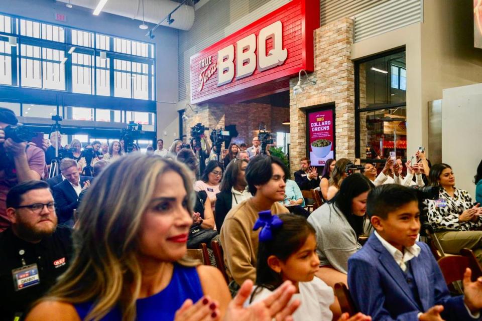 A crowd gathers before the ribbon cutting of H-E-B’s location in Frisco, Texas, on Tuesday, Sept. 20, 2022.