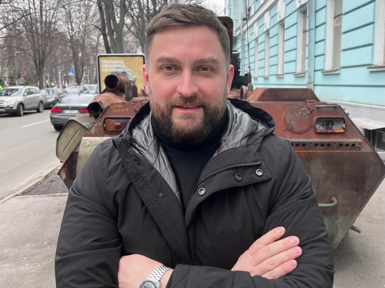 Photograph of Yegor Aushev crossing his arms in Kyiv