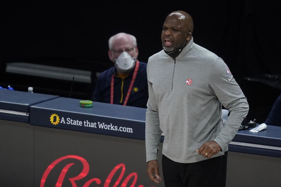 Atlanta Hawks head coach Nate McMillan in action during the first half of an NBA basketball game against the Indiana Pacers, Thursday, May 6, 2021, in Indianapolis. (AP Photo/Darron Cummings)