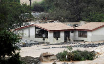 View of a flooded home after the Rimac river overflowed near the Central Highway in Huarochiri, Lima, Peru, March 23, 2017. REUTERS/Guadalupe Pardo