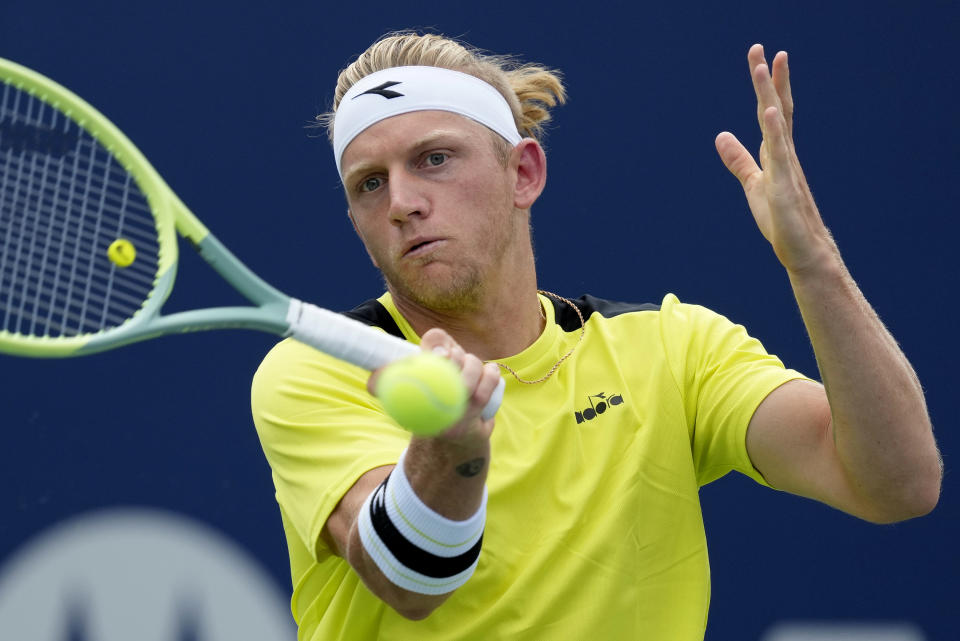 Alejandro Davidovich Fokina of Spain returns to Alex de Minaur of Australia during the semifinals of the National Bank Open men’s tennis tournament Saturday, Aug. 12, 2023, in Toronto. (Frank Gunn/The Canadian Press via AP)