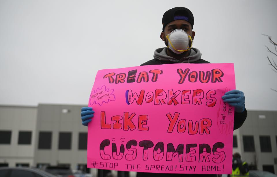 Amazon workers at Amazon's Staten Island warehouse strike in demand that the facility be shut down and cleaned after one staffer tested positive for the coronavirus on March 30, 2020 in New York. - Amazon employees at a New York City warehouse walk off the job March 30, 2020, as a growing number of delivery and warehouse workers demand better pay and protections in the midst of the COVID-19 pandemic. (Photo by Angela Weiss / AFP) (Photo by ANGELA WEISS/AFP via Getty Images)