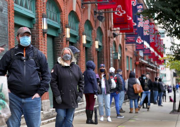 PHOTO: Hundreds stand in line to vote at Fenway Park in Boston, Oct. 17, 2020. (John Tlumacki/The Boston Globe via Getty Images)