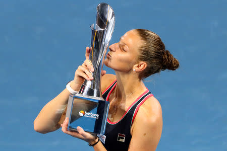 Tennis - Brisbane International - Women's Final - Pat Rafter Arena, Brisbane, Australia, January 6, 2019 Czech Republic's Karolina Pliskova celebrates with the trophy after winning the final against Ukraine's Lesia Tsurenko REUTERS/Patrick Hamilton