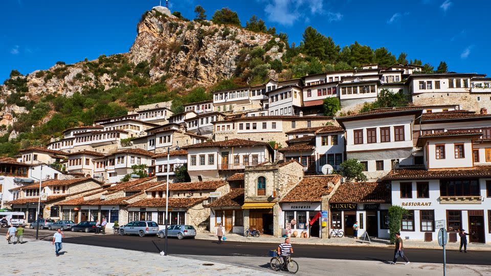 Albania has a rich culture, including Christian and Muslim history, with historical centers in towns such as Gjirokastër and Berat (pictured). - Tuul & Bruno Morandi/The Image Bank Unreleased/Getty Images