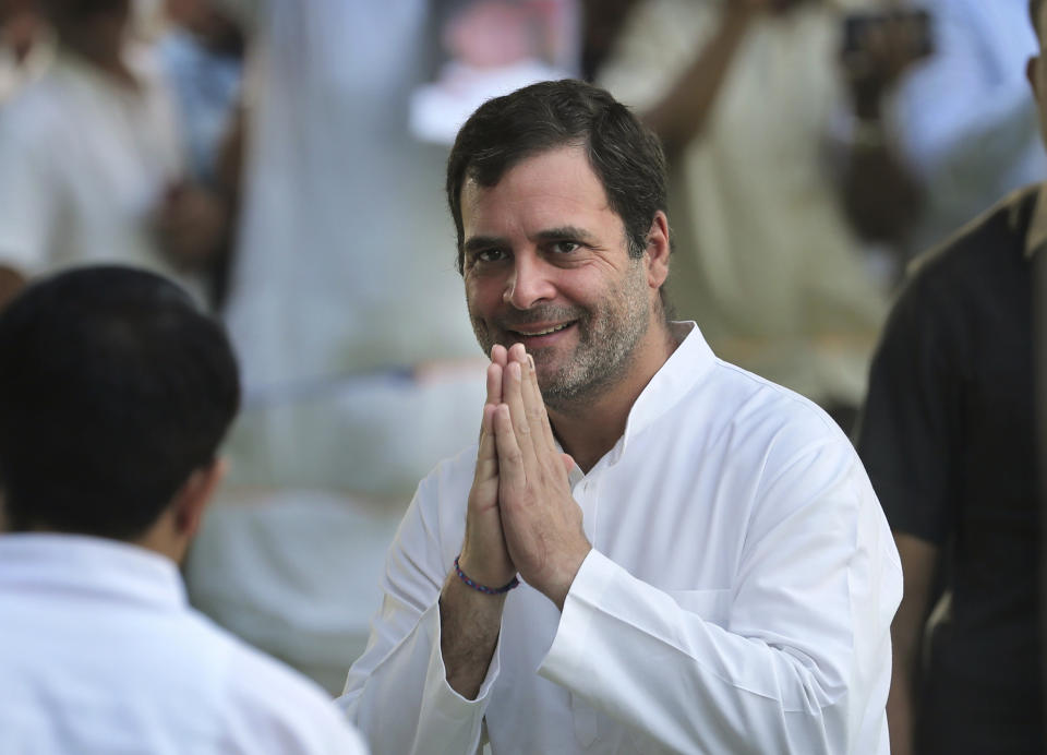 FILE - In this May 21, 2019, file photo, Congress Party President Rahul Gandhi, greets people during a function in New Delhi, India. Gandhi has resigned as president of India's opposition Congress party to take responsibility for its crushing defeat in recent elections. (AP Photo/Manish Swarup, File)