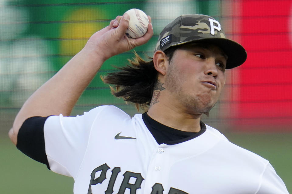 Pittsburgh Pirates starting pitcher Miguel Yajure delivers during the first inning of the team's baseball game against the San Francisco Giants in Pittsburgh, Friday, May 14, 2021. (AP Photo/Gene J. Puskar)