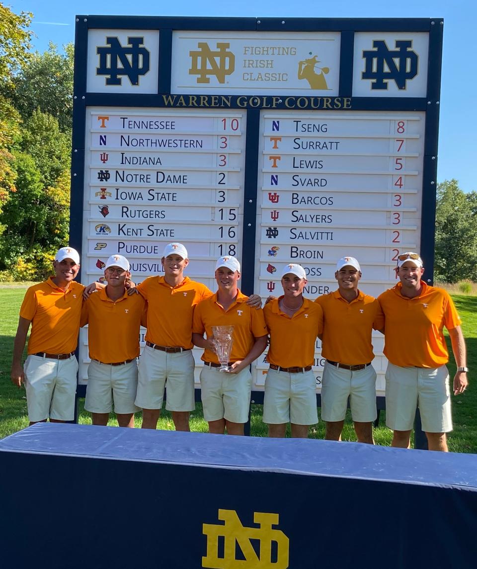 The No. 5 Tennessee men's golf team poses with the team championship trophy Monday after winning the Fighting Irish Classic on Warren Golf Course at Notre Dame.