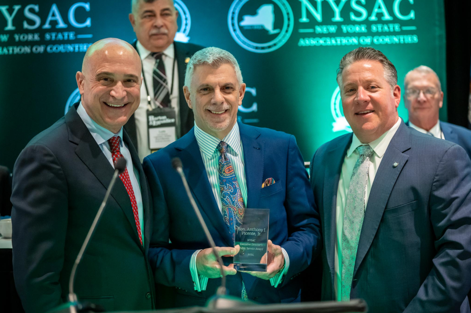 From left: NYSAC Executive Director Stephen Acquario, Oneida County Executive Anthony Picente, NYSAC President Daniel P. McCoy.