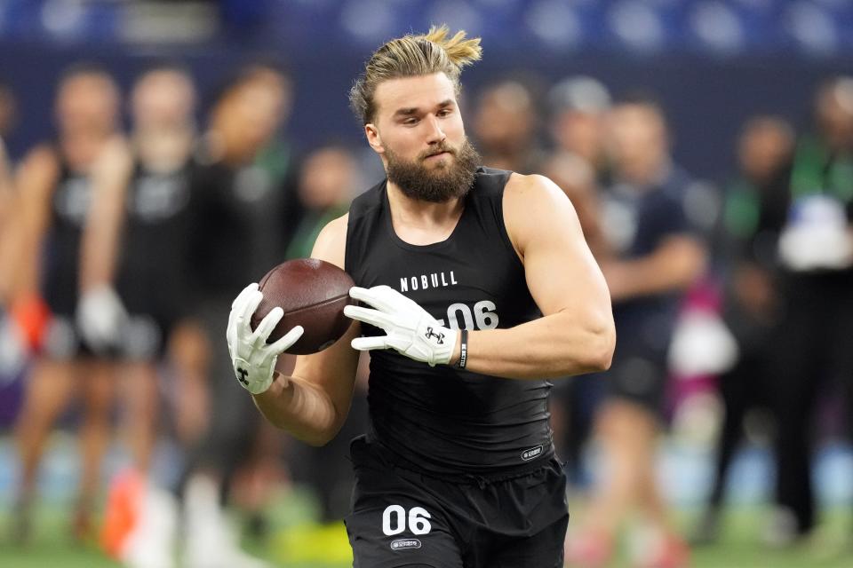 Mar 1, 2024; Indianapolis, IN, USA; Colorado State tight end Dallin Holker (TE06) works out during the 2024 NFL Combine at Lucas Oil Stadium. Mandatory Credit: Kirby Lee-USA TODAY Sports