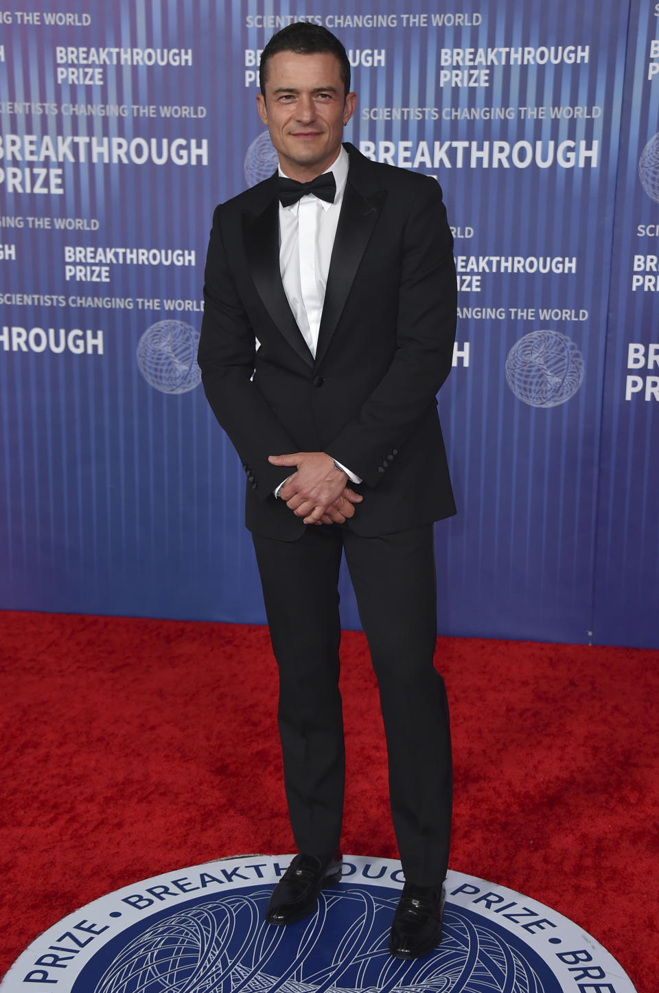 Orlando Bloom arrives at the tenth Breakthrough Prize Ceremony on Saturday, April 13, 2024, at the Academy Museum of Motion Pictures in Los Angeles. (Photo by Jordan Strauss/Invision/AP)