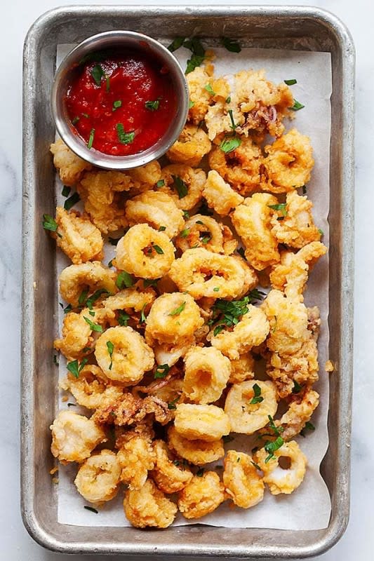 <p>Rasa Malaysia</p><p>Fried Calamari - deep fried calamari recipe Italian style. Serve with tomato sauce as dipping sauce, this is the best recipe ever, extra crispy, easy and delicious!</p><p><strong>Get the recipe: <a href="https://rasamalaysia.com/fried-calamari/" rel="nofollow noopener" target="_blank" data-ylk="slk:Fried Calamari;elm:context_link;itc:0;sec:content-canvas" class="link ">Fried Calamari</a></strong></p>