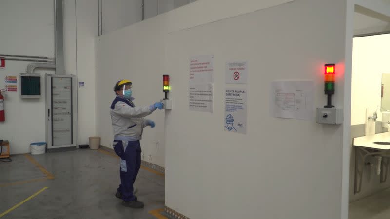 A worker is seen inside the ISA factory in Bastia Umbra