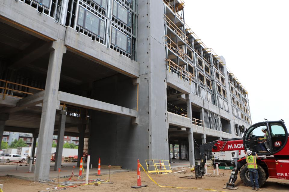 Windows are getting installed on the Canopy by Hilton hotel at the Steel District on June 16, 2023 in downtown Sioux Falls.