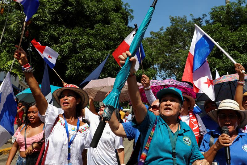 People react after Panama's top court ruled the mining contract with Canadian miner First Quantum to operate a copper mine in the country as unconstitutional, in Panama City