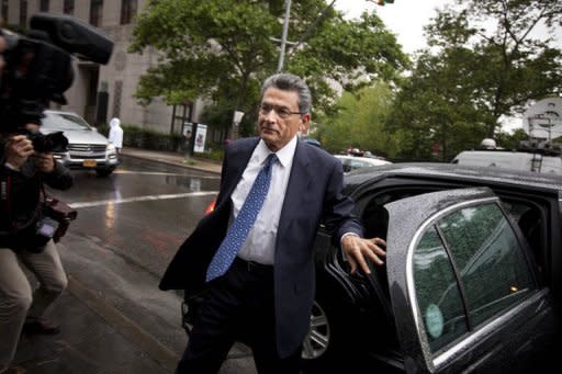 Former director and former senior partner at McKinsey & Co. Rajat Gupta arrives at federal court for an insider trading trial June 4, 2012 in New York City. Gupta is accused of feeding non-public information to Galleon Group founder Rajaratnam, who was sentenced last year to 11 years in prison for insider trading