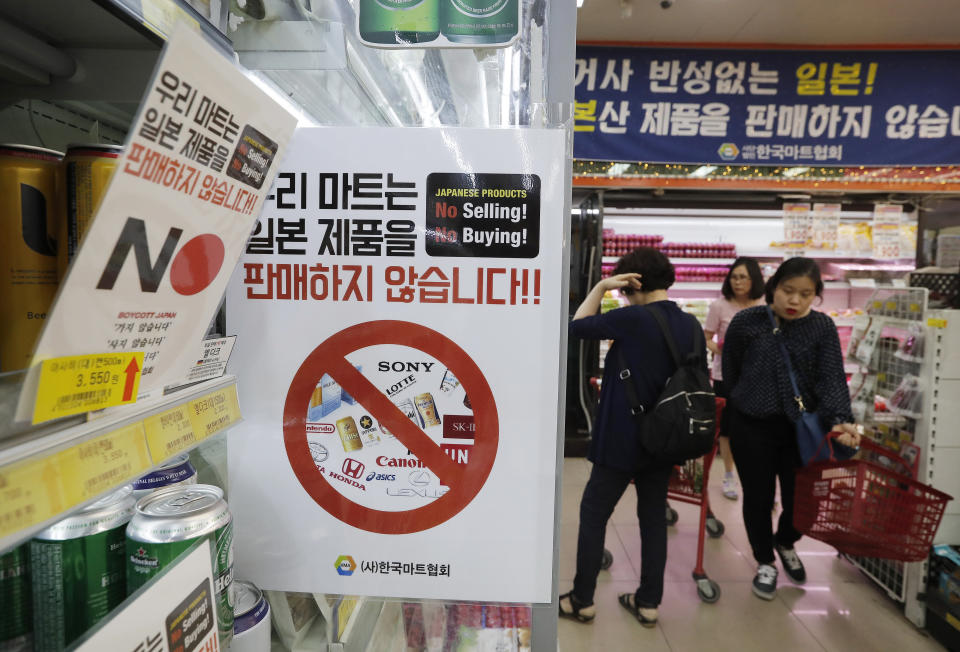 In this July 9, 2019, photo, notices campaigning for a boycott of Japanese-made products is displayed at a store in Seoul, South Korea. The signs read: "We don't sell Japanese products." A widespread anti-Japanese boycott has gained ground in South Korea since Tokyo tightened its exports of materials used to manufacture semiconductors and display screens, key export items for South Korea. (AP Photo/Ahn Young-joon)