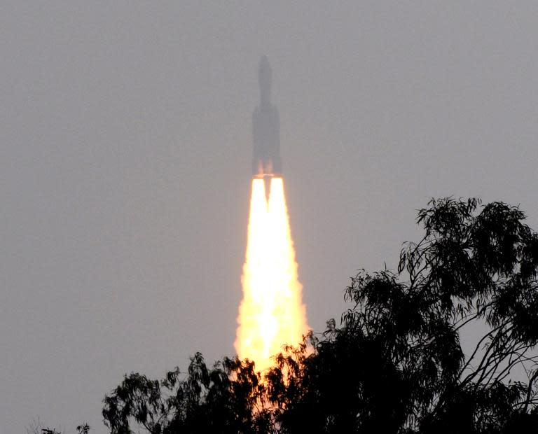 The Geostationary Satellite Launch Vehicle (GSLV) Mk-III rocket lifts off from The Satish Dhawan Space Centre on Sriharikota Island, some 80kms north of Chennai, December 18, 2014