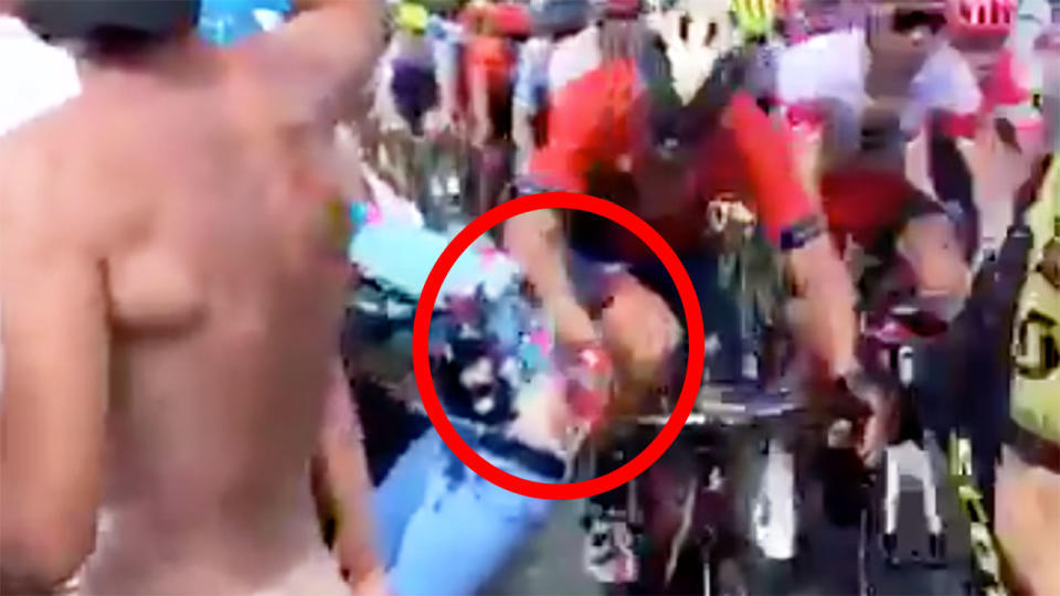 A cheeky Tour de France fan got more than he bargained for when he mooned the passing peleton.
