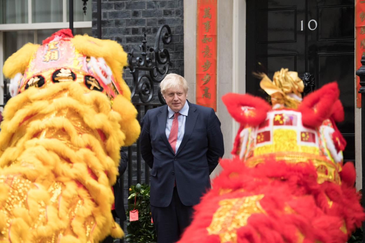 Prime Minister Boris Johnson welcomes members of the Chinese community at 10 Downing Street, London, in celebration of the Chinese New Year. (PA Wire/PA Images)