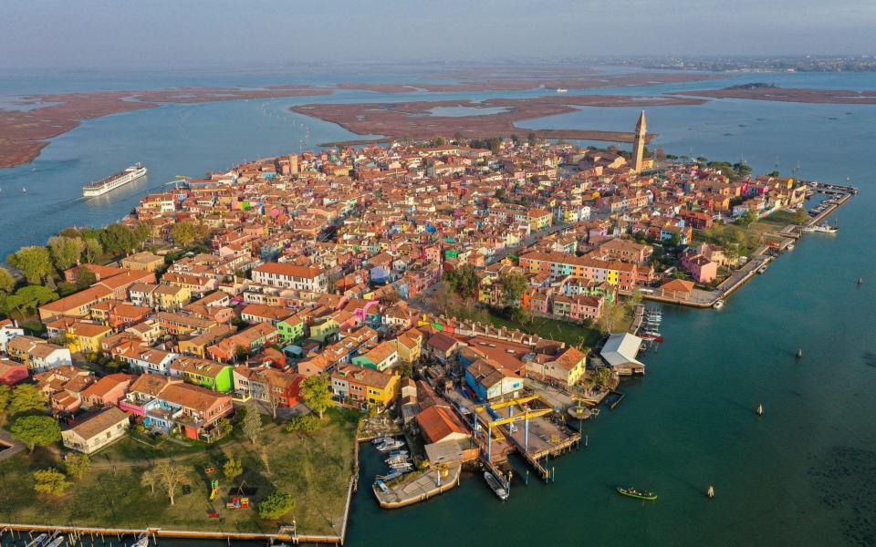 Pass through Burano during a cruise from Venice