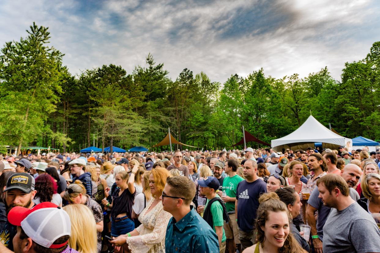 Guests gather for an event in The Meadow at Highland Brewing.