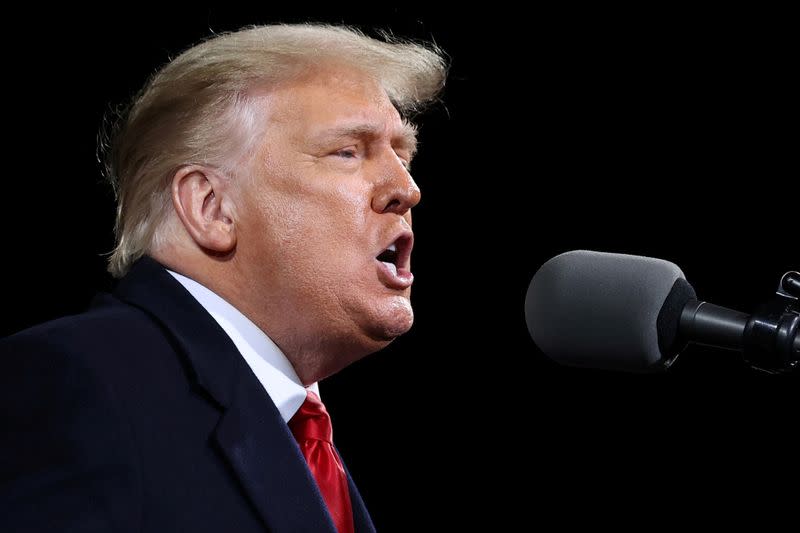 FILE PHOTO: U.S. President Trump campaigns for Republican U.S. senators Perdue and Loeffler during a rally in Valdosta, Georgia