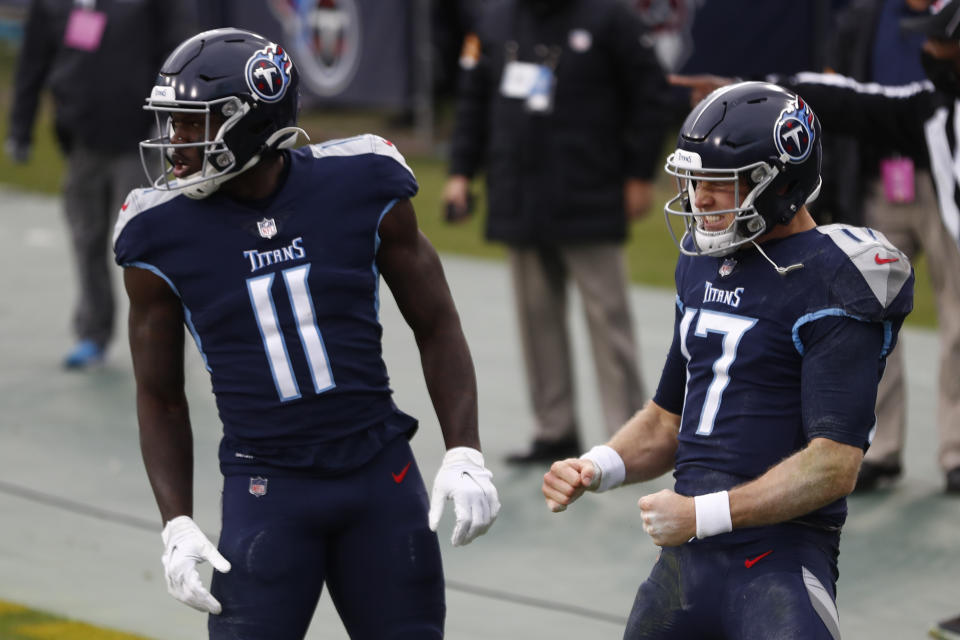 Tennessee Titans quarterback Ryan Tannehill celebrates after scoring during the first half of an NFL football game against the Detroit Lions Sunday, Dec. 20, 2020, in Nashville, N.C. (AP Photo/Wade Payne)
