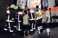 Paramedics help injured outside Turkey's largest airport, Istanbul Ataturk, Turkey, following a blast June 28, 2016. REUTERS/Ismail Coskun/IHLAS News Agency