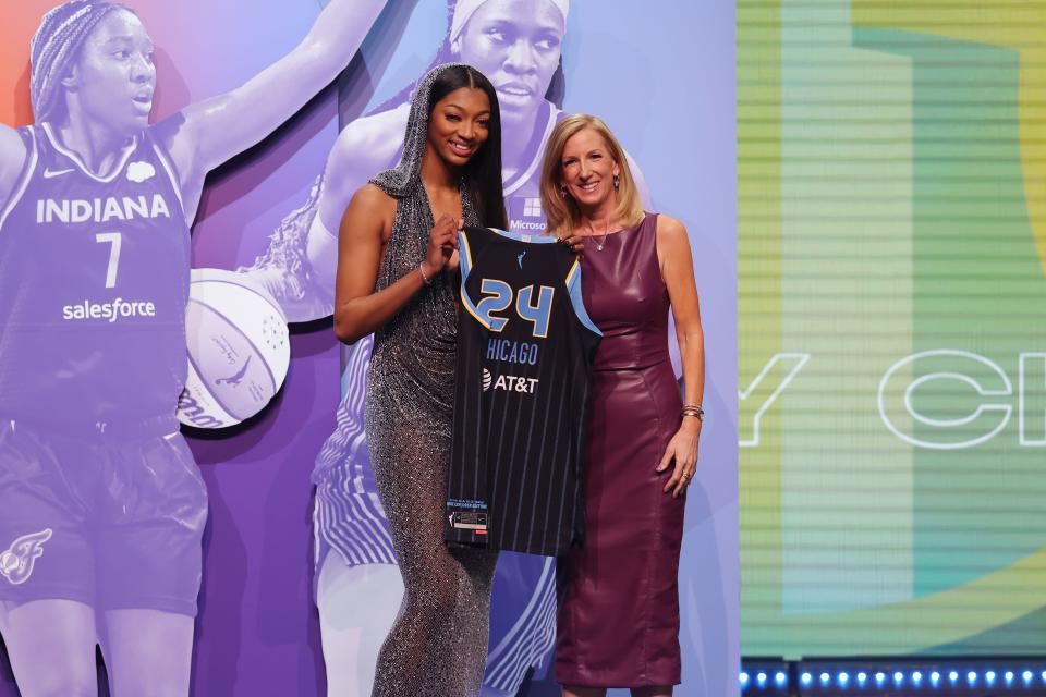Apr 15, 2024; Brooklyn, NY, USA; Angel Reese poses with WNBA commissioner Cathy Engelbert after she is selected with the seventh overall pick by the Chicago Sky n the 2024 WNBA Draft at Brooklyn Academy of Music. Mandatory Credit: Brad Penner-USA TODAY Sports