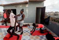 Wider Image: Meet Senegal's first female pro surfer inspiring girls to take to the waves