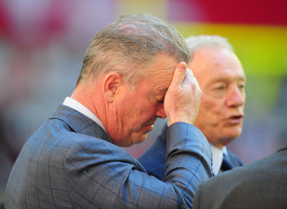 Dec. 4, 2011; Glendale, AZ, USA; Dallas Cowboys executive vice president Stephen Jones (left) reacts alongside owner Jerry Jones prior to the game against the Arizona Cardinals at University of Phoenix Stadium. Mandatory Credit: Mark J. Rebilas-USA TODAY Sports