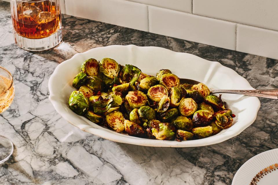 <h1 class="title">Roasted Brussels Sprouts with Garlic and Pancetta</h1><cite class="credit">Photo by Chelsea Kyle, Prop Styling by Beatrice Chastka</cite>