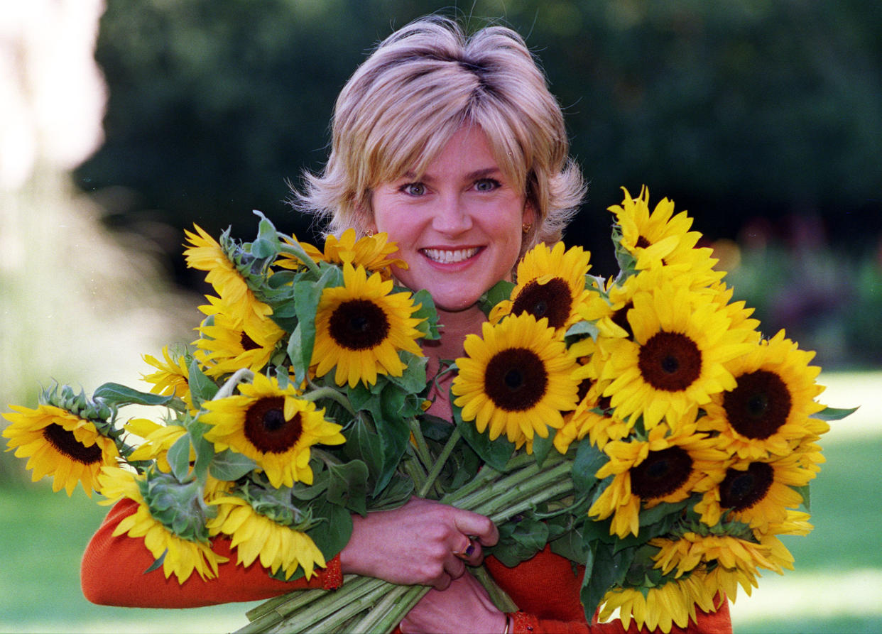 Former GMTV presenter Anthea Turner holding Sunflowers at the launch of the Live Every Moment Appeal, the UK Hospice movement's biggest ever fundraising appeal, organised by Help the Hospices and Sainsbury's, at Princess Alice Hospice in  Surrey.  * Live Every Moment badges, in the shape of a Sunflower will be on sale in all Sainsbury's stores, price   1 each, thoughout October. Miss Turner announced ner engagement to Grant Bovey earlier this week just three weeks after her divorce from former Radio One DJ Peter Powell and a month after 38-year-old Mr Bovey s divorce from his wife Della.   (Photo by Andrew Stuart - PA Images/PA Images via Getty Images)