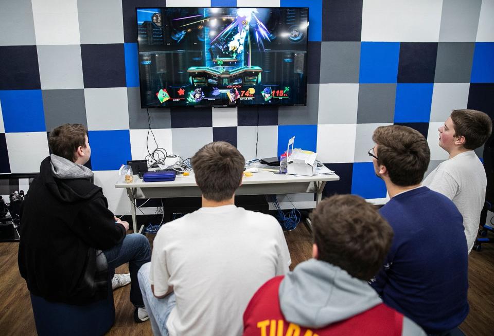 A group of students practices at an Esports facility in an Indiana high school in December 2018.