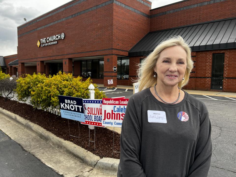 Volunteer poll watcher Averil Glover oversaw early voting in Johnson County, North Carolina. She was allowed to be there under new state rules giving poll watchers more freedom to move around polling stations. She worries about fraud in elections.