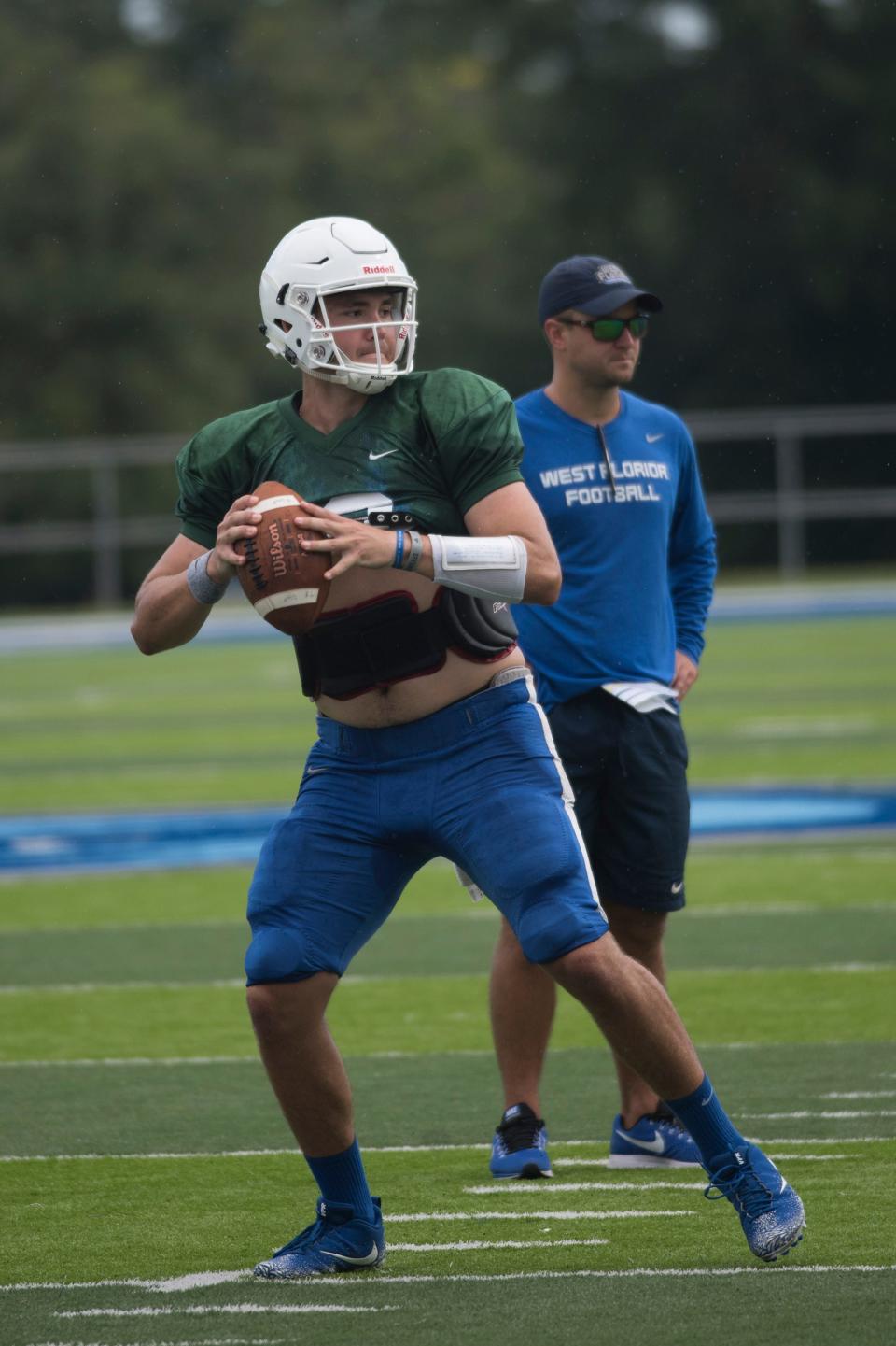 University of West Florida quarterback, Mike Beaudry, gets in his reps during team practice on Friday, Aug. 10, 2018.