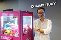 Ryan Lee, the co-founder and CFO of SmartStudy, poses for photographs at the company's office in Seoul