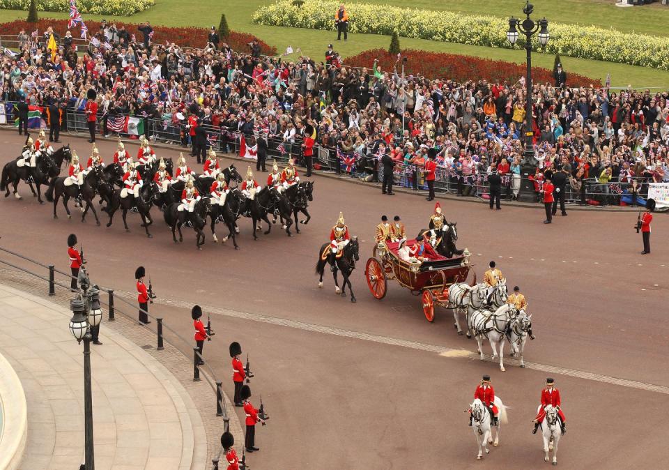 The procession included a very, very old carriage.