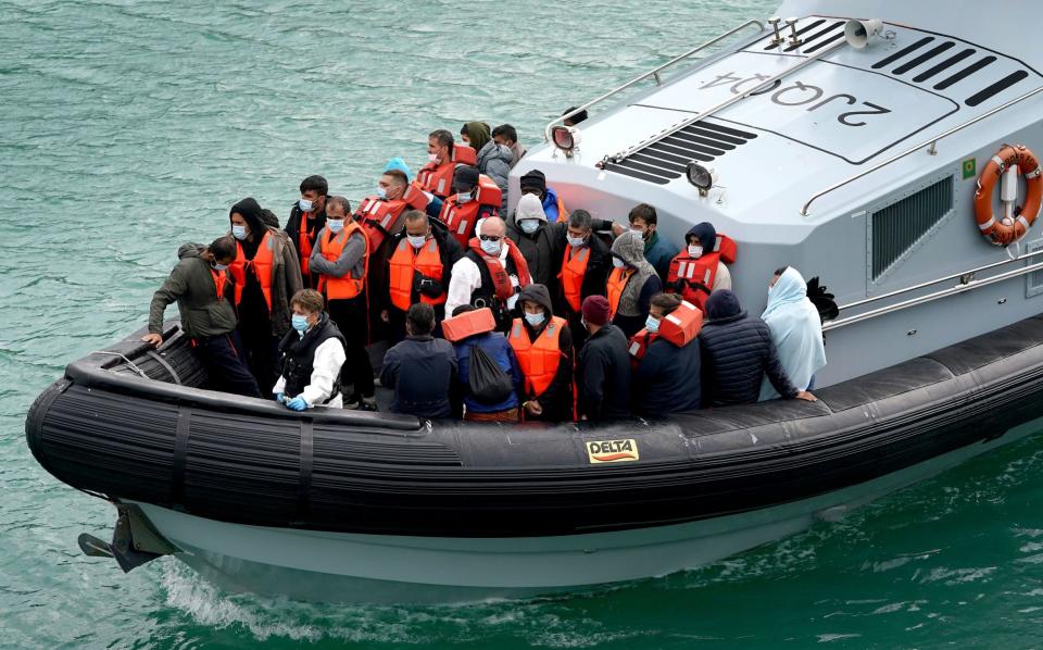 A group of people thought to be migrants are brought in to Dover, Kent, by Border Force - Gareth Fuller/PA